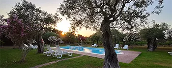 Бассейн на закате отеля типа «постель и завтрак» Villa Grazia Альгеро - Сардиния - Италия