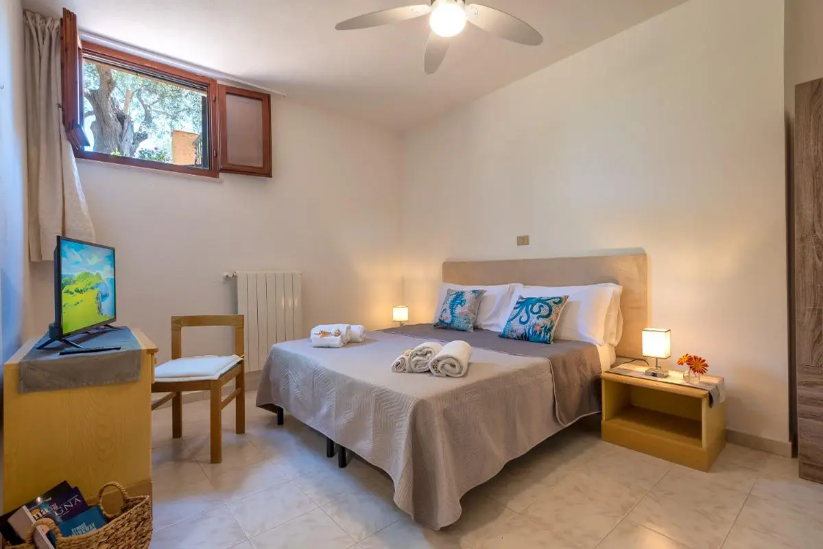 Villa Grazia Bed & Breakfast Alghero - Schlafzimmer im Erdgeschoss mit Fenster